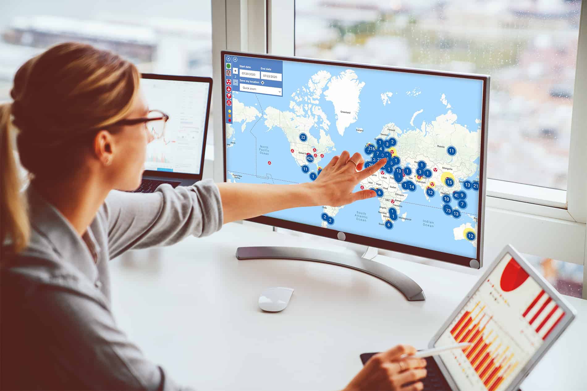 Business woman study financial market to calculate possible risks and profits.Female economist accounting money with statistics graphs pointing on screen of computer at desktop. Quotations on exchange