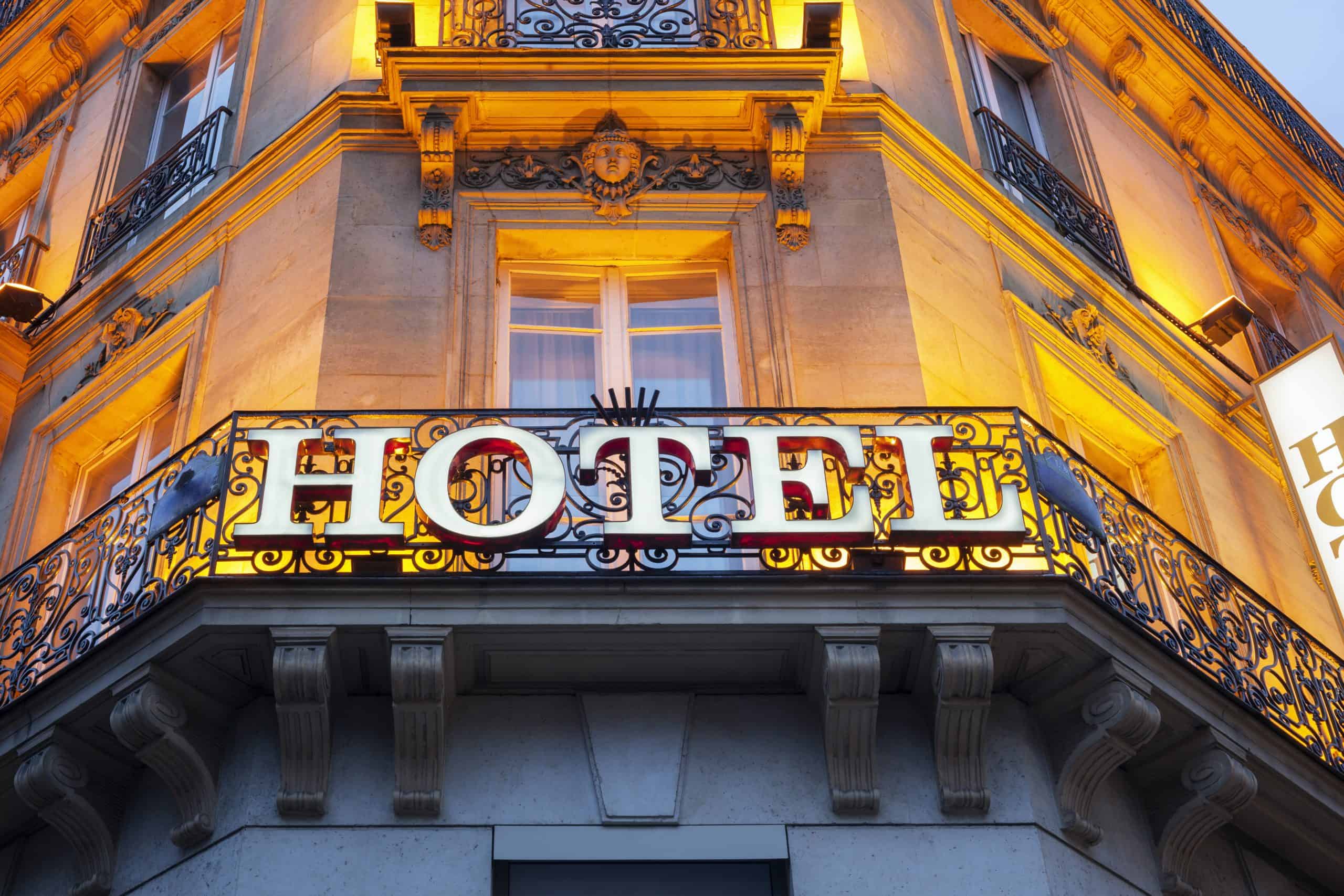 Illuminated hotel sign taken in Paris at night