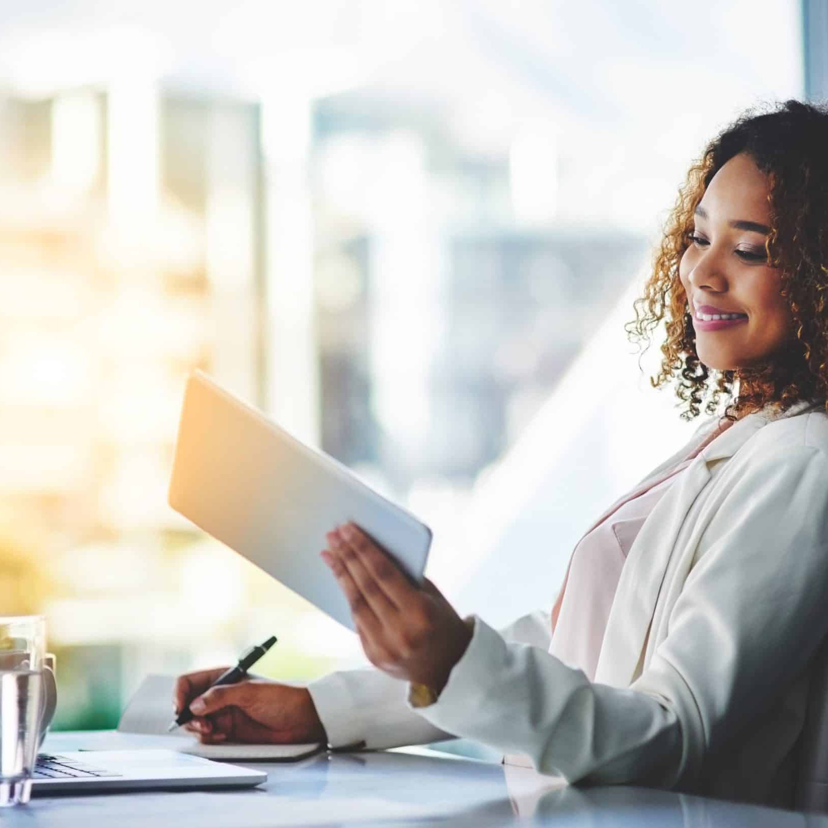 Shot of a young beautiful businesswoman working in the office